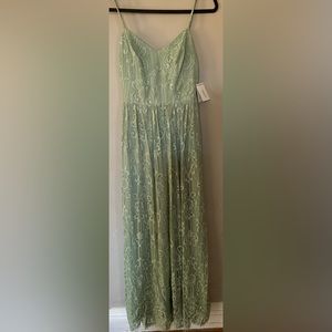 Beautiful long Aline V neck spaghetti strap. Size 2  Color Dust sage.